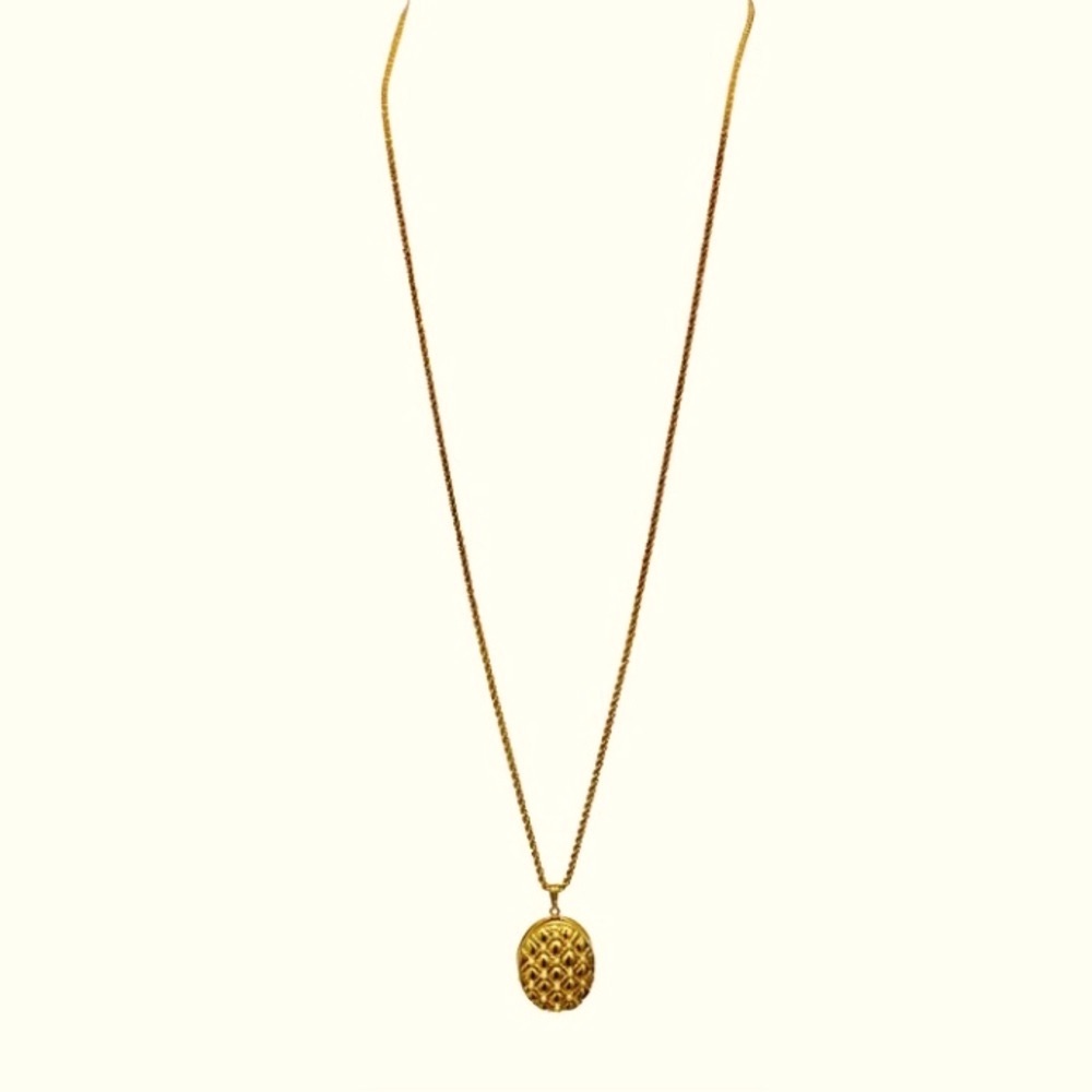 Joan Rivers gold pineapple locket necklace